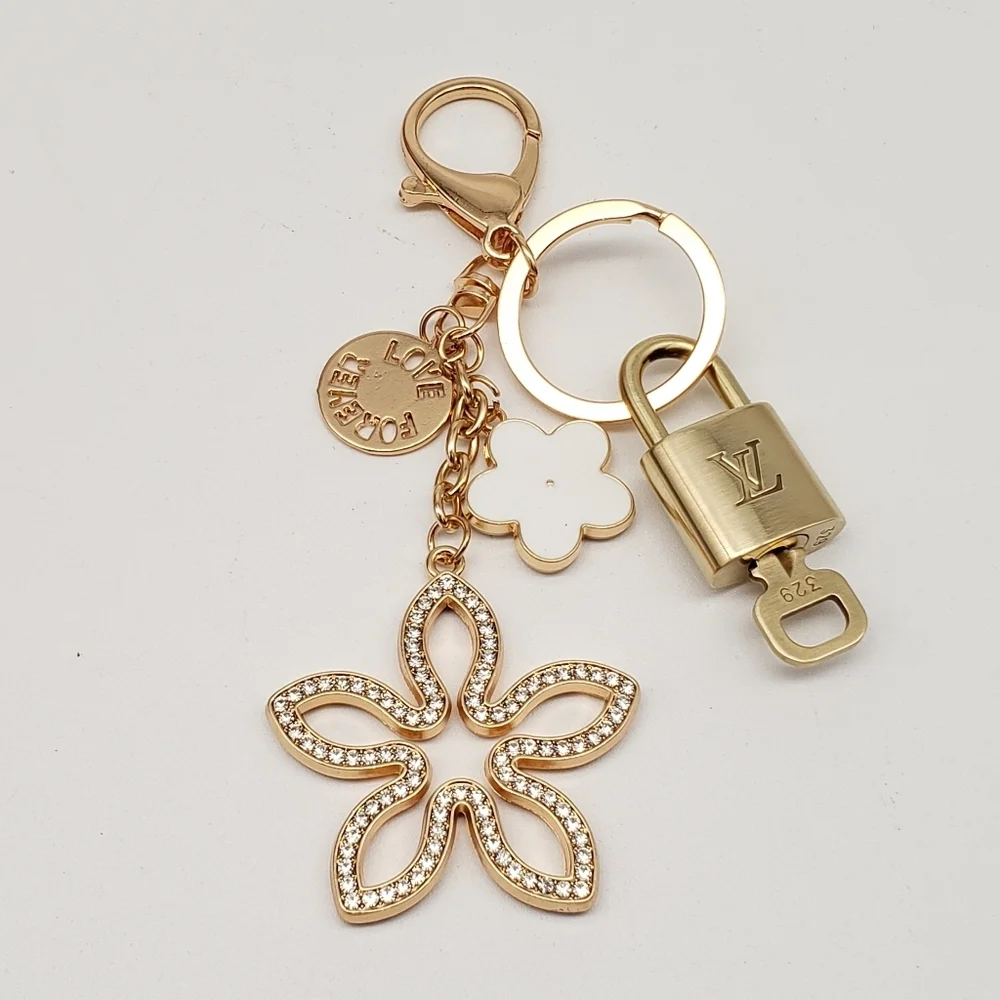 Authentic Louis Vuitton Gold Lock & Key 🔑 Bag Charm w/ Unbranded Clover Charm